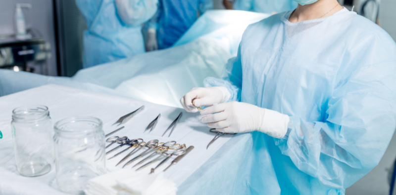 Doctor using surgical tools